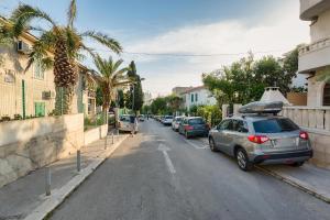 a car parked on the side of a street at Happy Home - Rental Residence in Split