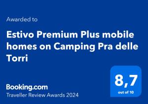 a screenshot of a cell phone with the text extra premium plus mobile homes on camping at Estivo Premium Plus mobile homes on Camping Pra delle Torri in Caorle
