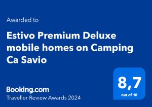 a screenshot of a phone with the text eviction premium deliver mobile homes on campus at Estivo Premium Deluxe mobile homes on Camping Ca Savio in Cavallino-Treporti