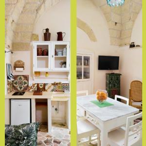 een keuken en eetkamer met een witte tafel bij Casa del Glicine Andrano in Andrano