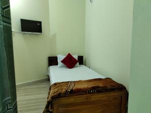Postel nebo postele na pokoji v ubytování Hotel Shopno Nibash