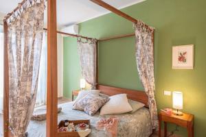 Postel nebo postele na pokoji v ubytování Il Sogno, Luxury Apartment in Piazza Napoleone