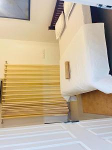 Postel nebo postele na pokoji v ubytování FULL MOON HOMES