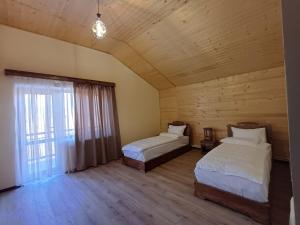 Postel nebo postele na pokoji v ubytování Jean Chardin Dilijan