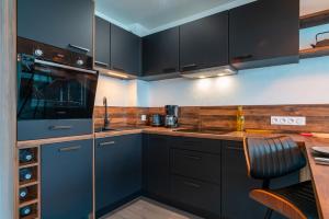 Cuisine ou kitchenette dans l'établissement La Proue - Charmant appt vue mer