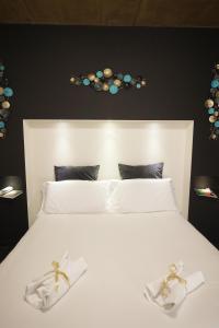 Postel nebo postele na pokoji v ubytování Civico 69 Luxury room