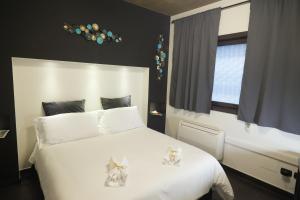 Postel nebo postele na pokoji v ubytování Civico 69 Luxury room