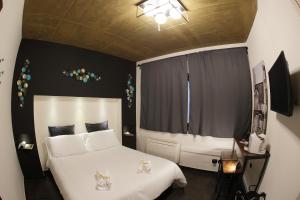 Postel nebo postele na pokoji v ubytování Civico 69 Luxury room