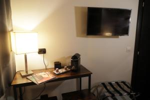 TV a/nebo společenská místnost v ubytování Civico 69 Luxury room
