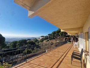 a balcony of a house with a view at Villa Maresme & Villa Rosa in Mataró