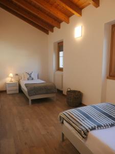 A bed or beds in a room at The Lake Home