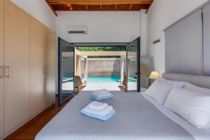 A bed or beds in a room at Unlimited Blue