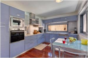 A kitchen or kitchenette at Unlimited Blue