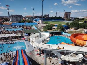 a large water park with a pool and slides at Vip Villa Jagodina - Jakuzzi is free - Private parking is free - Beautiful view of nature in Jagodina