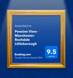 a gold picture frame on a blue wall at Pennine View - Manchester: Rochdale Littleborough in Littleborough