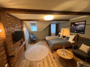 TV a/nebo společenská místnost v ubytování Hotel McLimon