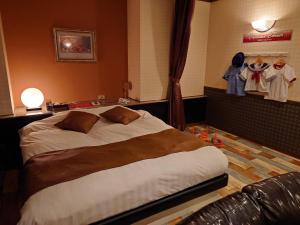 Postel nebo postele na pokoji v ubytování Hotel Fantacy (Adult Only)