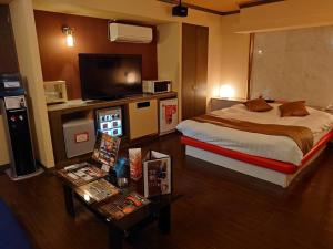 Postel nebo postele na pokoji v ubytování Hotel Fantacy (Adult Only)