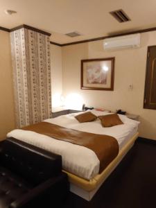 Postel nebo postele na pokoji v ubytování Hotel Fantacy (Adult Only)