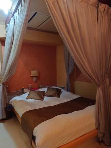 Postel nebo postele na pokoji v ubytování Hotel Fantacy (Adult Only)