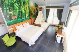 Postel nebo postele na pokoji v ubytování Elegance House