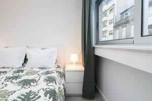 Ένα ή περισσότερα κρεβάτια σε δωμάτιο στο Moreira Terrace