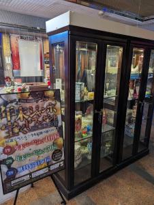 a display case with food inside of a store at Hotel Fantacy (Adult Only) in Hamamatsu