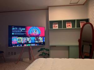A television and/or entertainment centre at Pink House
