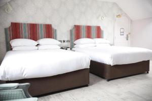Postel nebo postele na pokoji v ubytování DoubleTree by Hilton York