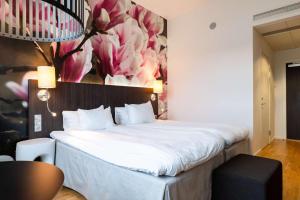Ένα ή περισσότερα κρεβάτια σε δωμάτιο στο Best Western Plus Park City Lund