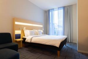 Postel nebo postele na pokoji v ubytování Best Western Plus Park City Malmö + 37 fotografií