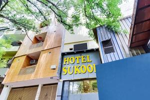 a hotel suboda is shown in front of a building at Roomshala 152 Hotel Sukoon - Ramesh Nagar Metro Station in New Delhi