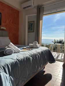 Postel nebo postele na pokoji v ubytování Vladimiros Apartments