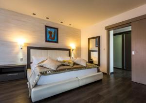 Giường trong phòng chung tại Hotel Stara Planina