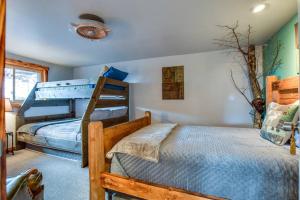 a bedroom with two bunk beds in a room at Home away from home. in Wisconsin Dells
