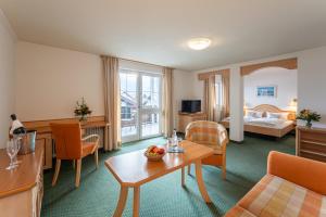 TV a/nebo společenská místnost v ubytování Hotel Filser