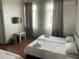 Postel nebo postele na pokoji v ubytování Emilia + 27 fotografií