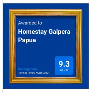 un cadre photo avec le texte attribué à l'homogénéité galeria papapa dans l'établissement Homestay Galpera Papua, à Jayapura