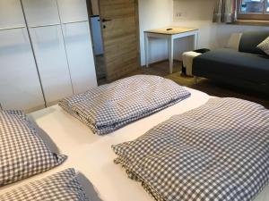 Postel nebo postele na pokoji v ubytování Almchalet Zillertal