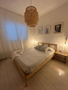 Postel nebo postele na pokoji v ubytování APARTAMENTO PEÑISCOLA