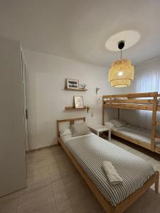 Postel nebo postele na pokoji v ubytování APARTAMENTO PEÑISCOLA + 32 fotografií