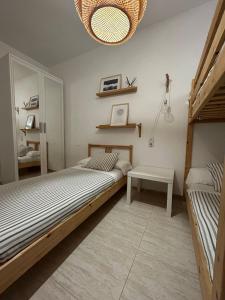 Postel nebo postele na pokoji v ubytování APARTAMENTO PEÑISCOLA