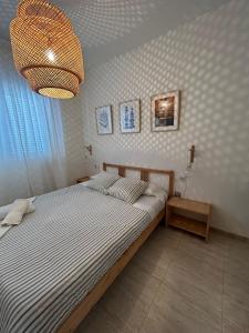 Postel nebo postele na pokoji v ubytování APARTAMENTO PEÑISCOLA