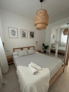 Postel nebo postele na pokoji v ubytování APARTAMENTO PEÑISCOLA