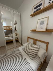 Postel nebo postele na pokoji v ubytování APARTAMENTO PEÑISCOLA