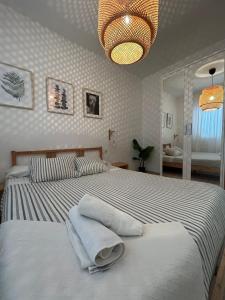Postel nebo postele na pokoji v ubytování APARTAMENTO PEÑISCOLA
