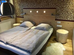 Postel nebo postele na pokoji v ubytování Almchalet Zillertal + 37 fotografií