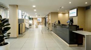an empty lobby of a hospital at Ilunion Auditori in Barcelona +37 photos