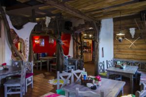 Reštaurácia alebo iné gastronomické zariadenie v ubytovaní Penzion Hacienda Ranchero
