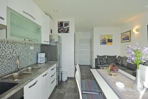 a kitchen with a sink and a counter top at Harmony Drasnice in Drašnice